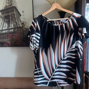 Short sleeve top. Never worn